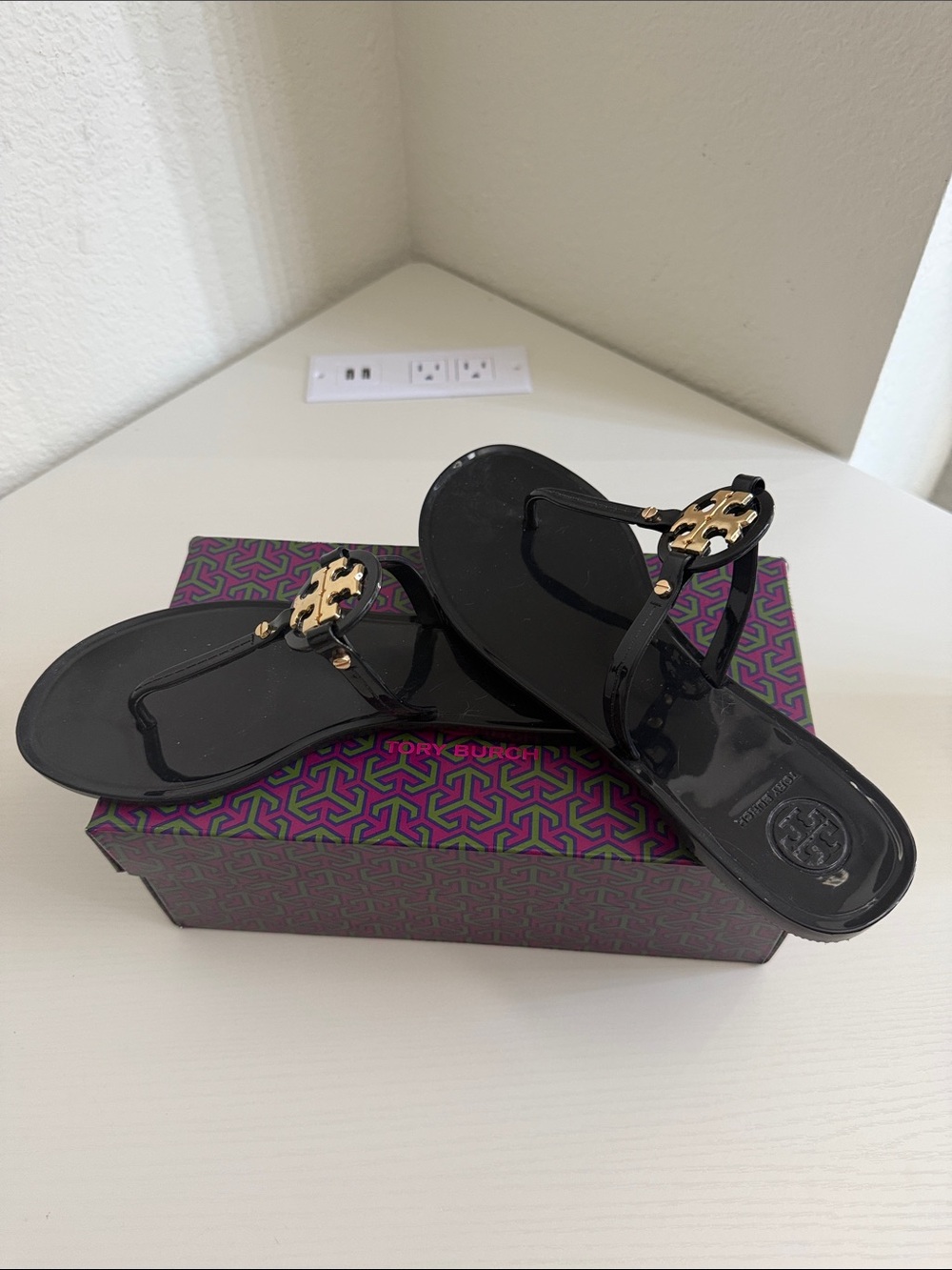 Tory Burch Black Jelly Thong Sandals with Gold Logo Accent